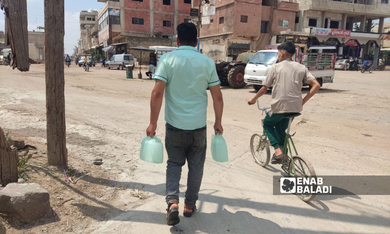 Ice blocks are a way to beat the heat in western rural Daraa - 26 July 2024 (Enab Baladi/Halim Muhammad)