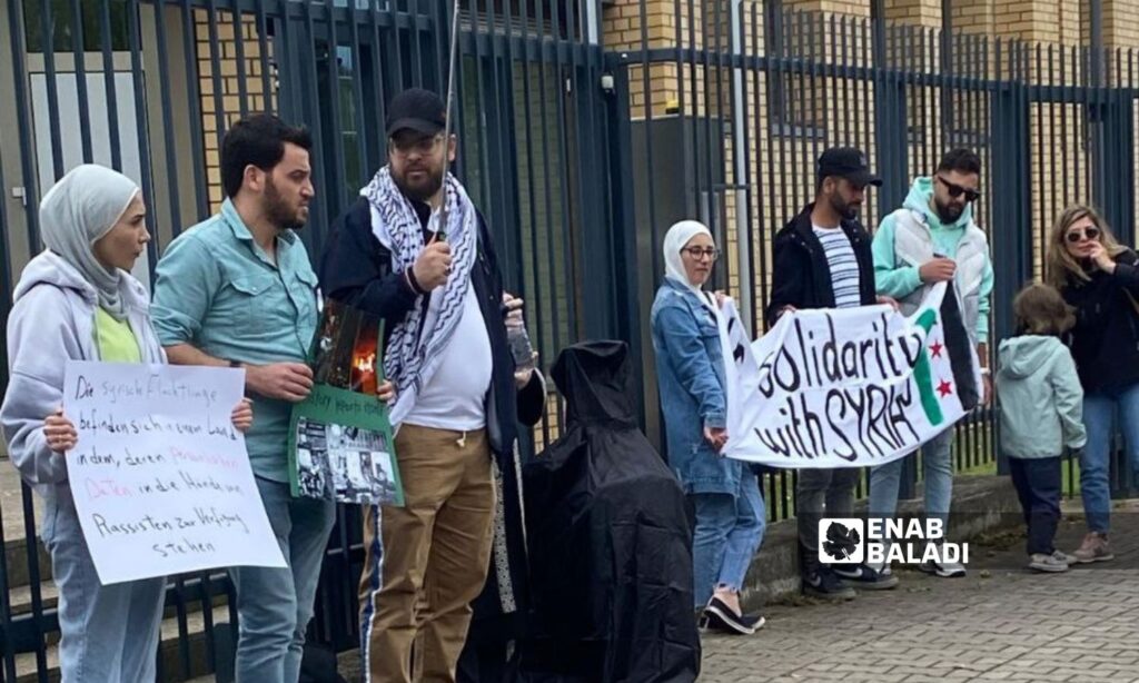 Syrian refugees raised banners demanding an end to racism against refugees residing in Turkey after a wave of attacks targeted Syrian homes in some Turkish cities - July 7, 2024 (Enab Baladi)