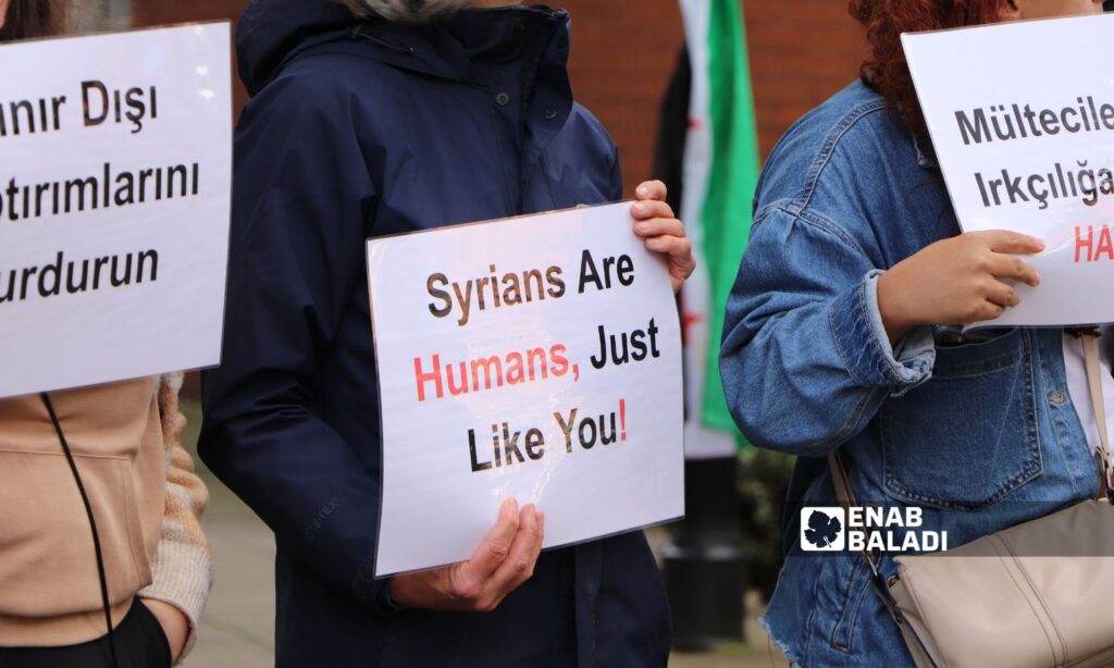 Coinciding with the sit-in in Germany, activists launched a protest in front of the Turkish embassy in the British capital, London, demanding an end to racism against Syrians in Turkey - July 7, 2024 (Enab Baladi)