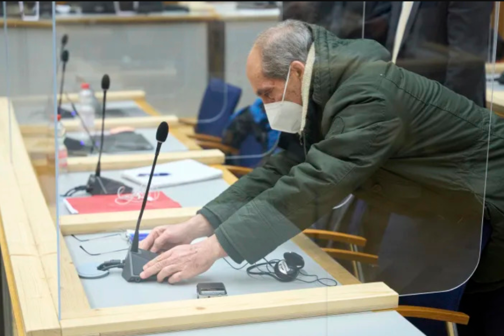 Anwar Raslan, who was sentenced to life imprisonment, inside the Koblenz court in southwestern Germany during a hearing of the non-final judgment - January 13, 2022 (AFP)