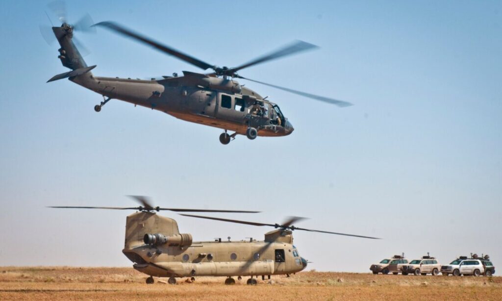 Military units of the International Coalition Forces in the vicinity of Manbij city in the eastern Aleppo province - June 21, 2018 (CENTCOM)