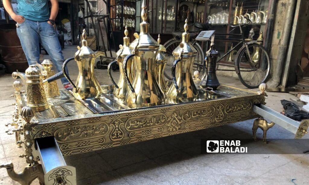 Copper handicrafts displayed in a shop in Dana, northern Idlib - July 2023 (Enab Baladi/Abdul Karim al-Thalji)