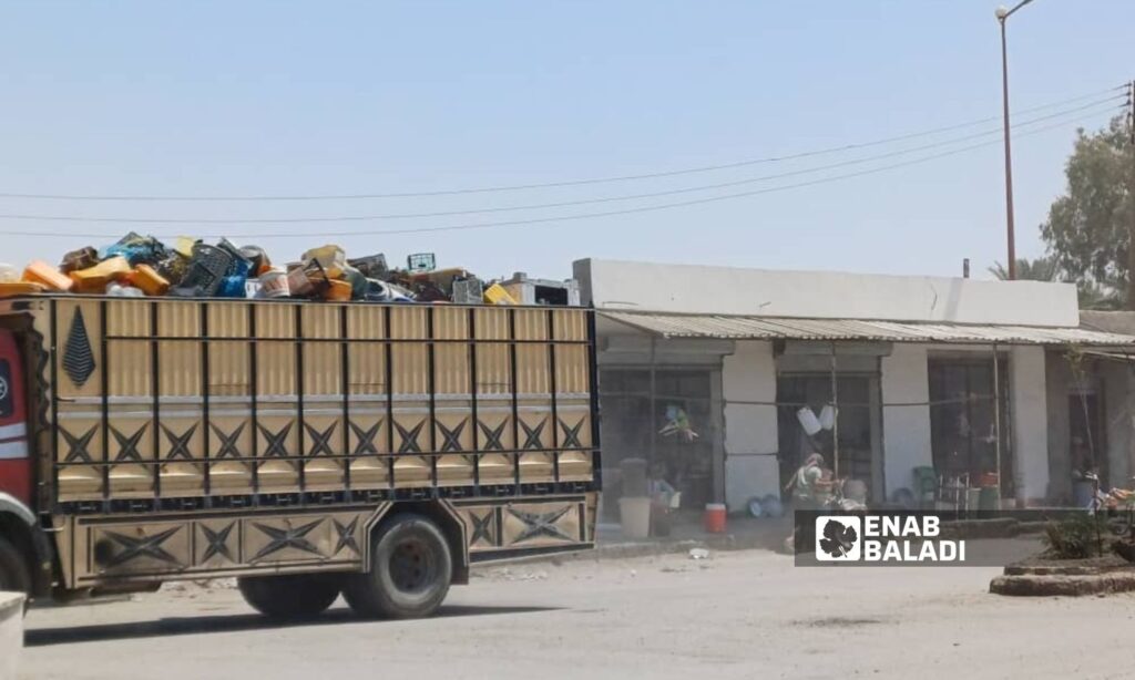 A truck driver working in scrap transport in the town of Granij in the eastern countryside of Deir Ezzor - August 23, 2024 (Enab Baladi/Obadah al-Sheikh)