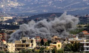 Smoke rises following an Israeli bombing on the village of Majdal Zoun in southern Lebanon (AFP)