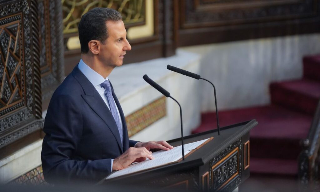 Bashar al-Assad speaking about socialism and state support during his speech before the People's Assembly - August 25, 2024 (Syrian Presidency/Facebook)