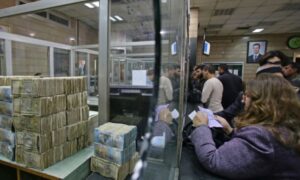 Syrians exchanging money at the Central Bank of Syria - April 2023 (Al-Baath newspaper)