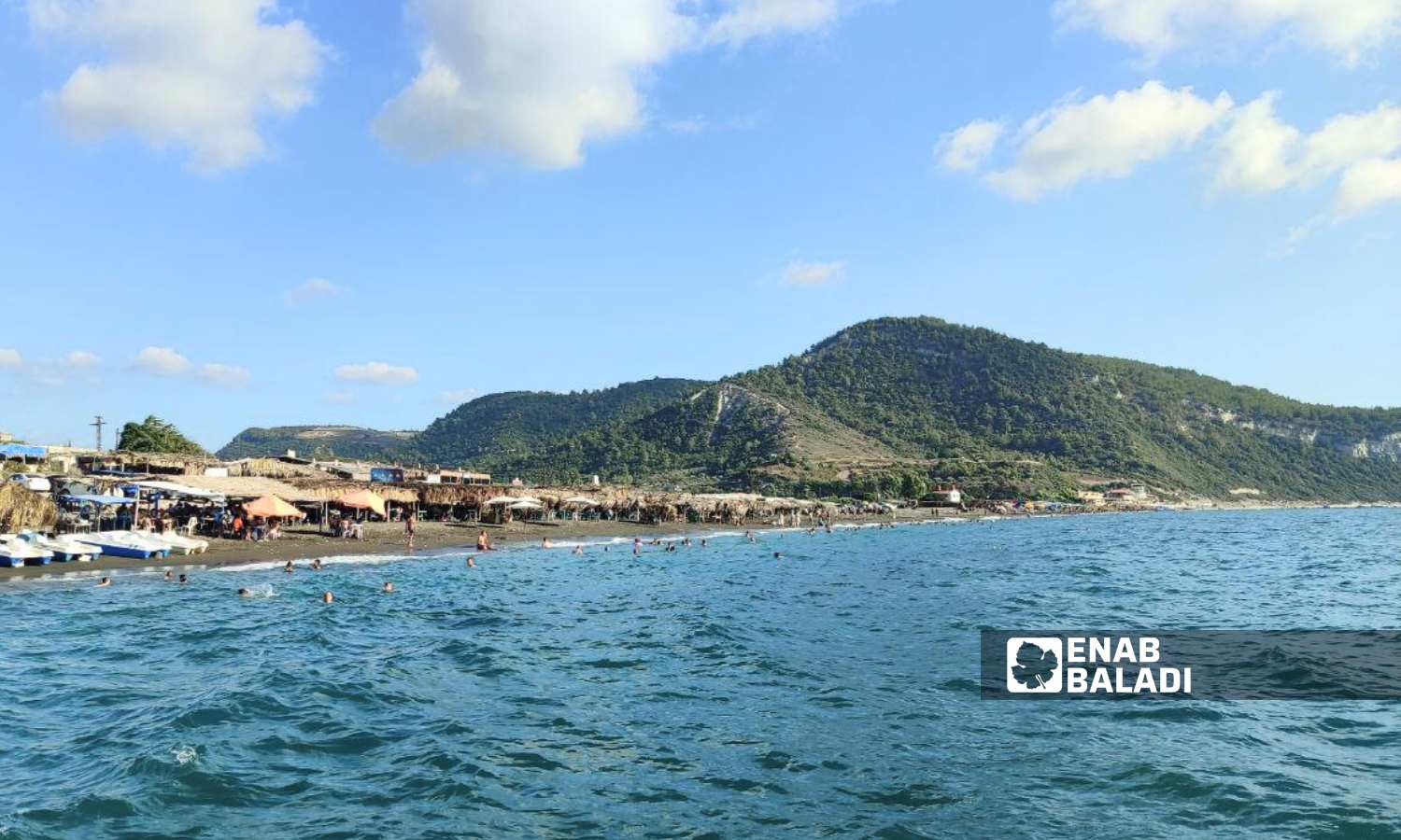 Wadi Qandil Beach for popular tourism in Latakia, northwest Syria - September 15, 2024 (Enab Baladi/Linda Ali)
