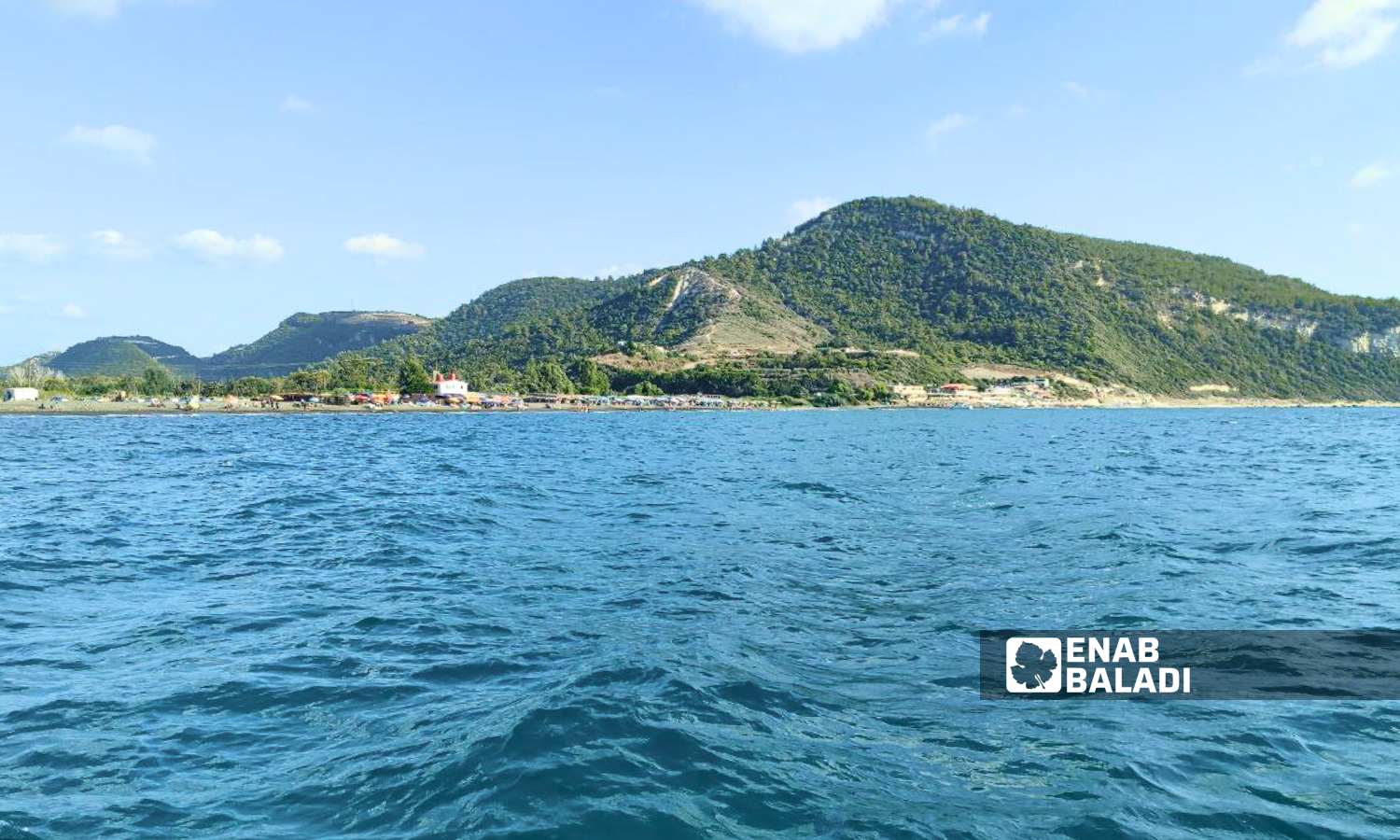 Wadi Qandil Beach for popular tourism in Latakia, northwest Syria - September 15, 2024 (Enab Baladi/Linda Ali)
