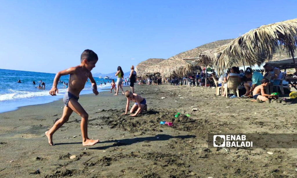 Children playing in Wadi Qandil Beach in Latakia - September 15, 2024 (Enab Baladi/Linda Ali)