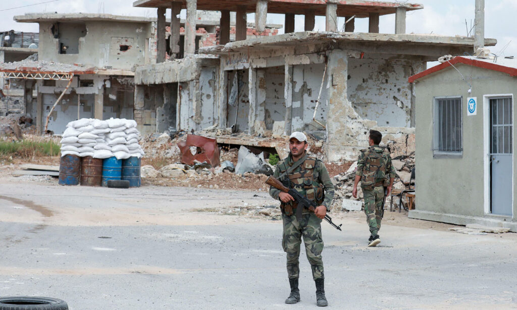 A checkpoint of regime forces in Daraa al-Balad - September 12, 2021 (AFP)