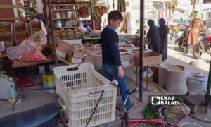 A grocery store selling food supplies on al-Jalaa Street in Douma - January 22, 2024 (Enab Baladi/Sarah al-Ahmad)