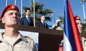 Russian President Vladimir Putin with Syrian regime leader Bashar al-Assad at the Hmeimim airbase in Latakia - December 11, 2017 (Xinhua)