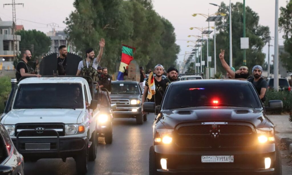 Fighters from the Men of Dignity Movement during a military parade in the As-Suwayda governorate - August 19, 2024 (Men of Dignity Movement/Facebook)