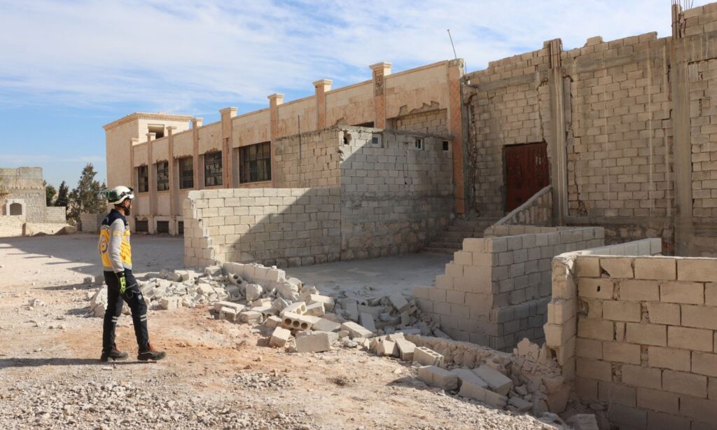 A Syria Civil Defence member inspects the damage caused by the regime's shelling in Darat Izza, Aleppo countryside - October 29, 2024 (Syria Civil Defence)