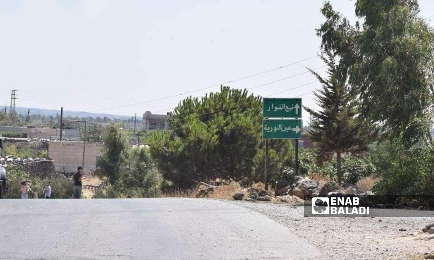 Children play on a main road in northern Quneitra countryside - November 11, 2023 (Enab Baladi/Muhannad Zain al-Din)