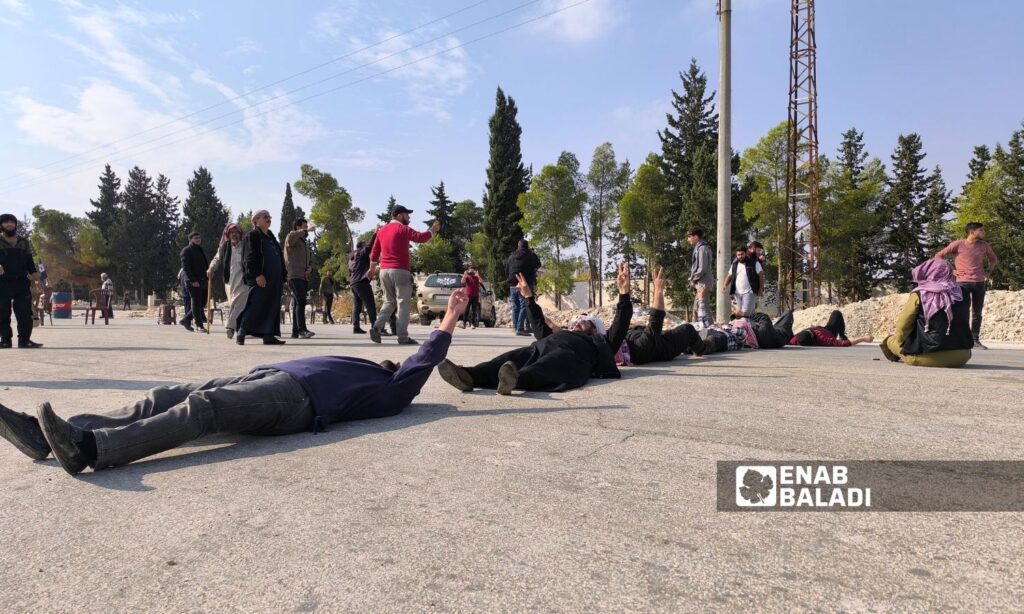 Protesters blocked the Abu al-Zandeen crossing road between areas controlled by the regime and the opposition near the city of al-Bab, eastern Aleppo - November 4, 2024 (Enab Baladi/Walid al-Idlibi)