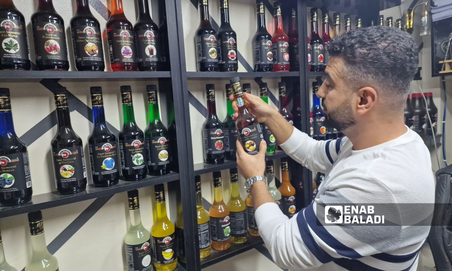 Drink flavor concentrates shops are facing challenges in marketing their products in Idlib - October 26, 2024 (Enab Baladi/Anas al-Khouli)