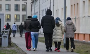 Migrants at an initial reception center in the German city of Eisenhüttenstadt (Patrick Pleul/DPA)