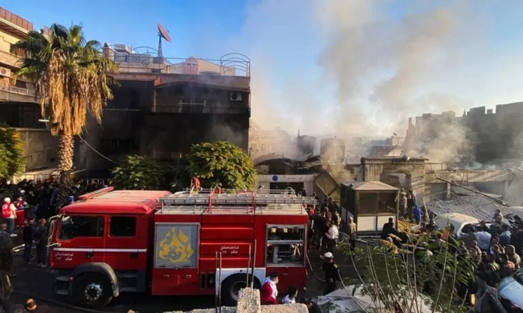 Rescue teams respond to a site bombed by Israeli aircraft in the Mezzeh neighborhood of Damascus - November 14, 2024 (Reuters)