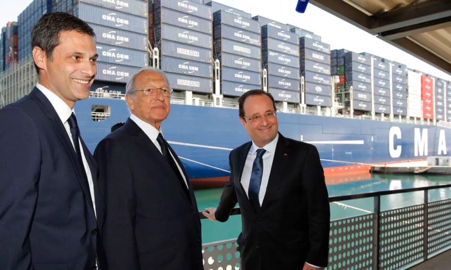 Former French President François Hollande stands with Jacques Saadé and his son Rodolphe Saadé - June 4, 2013 (AFP)