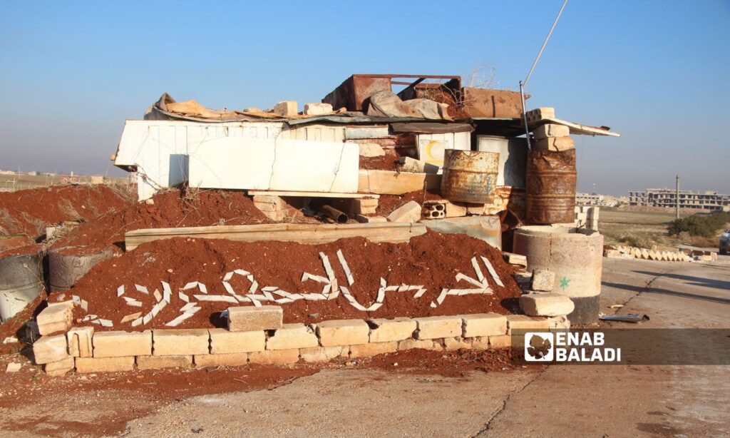 A barrier for the Syrian regime forces before the Syrian opposition factions took control of the city of Saraqib in the eastern Idlib countryside - November 30, 2024 (Enab Baladi/Iyad Abdul Jawad)