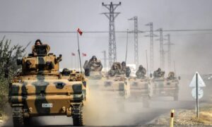 Turkish army tanks at the Syrian border - 2016 (AFP)