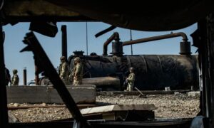 International Coalition forces patrol oil facilities that were hit by Turkish airstrikes in northeastern Syria - October 29, 2024 (AFP)
