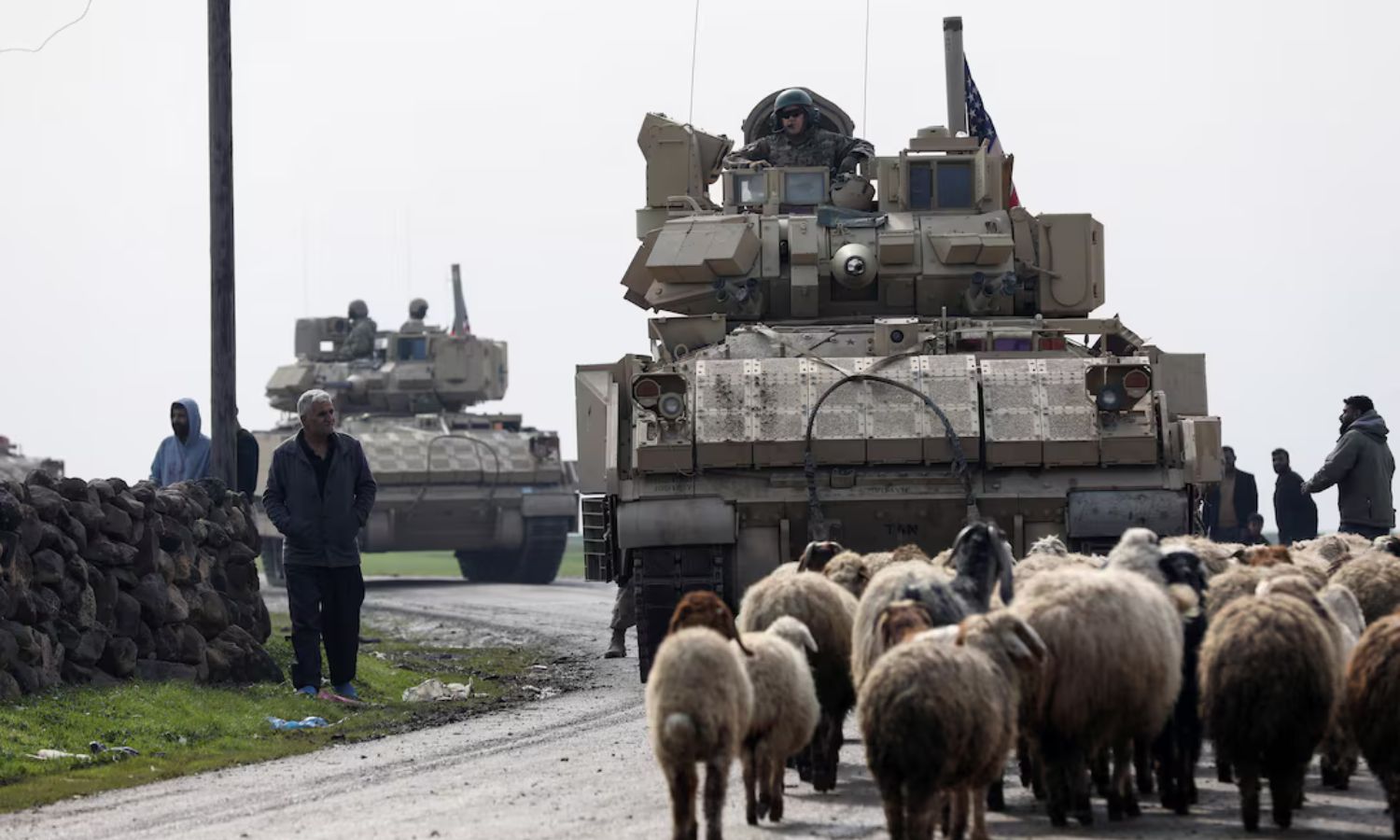 A joint patrol of US soldiers and members of the Syrian Democratic Forces (SDF) in Qamishli, northeastern Syria - February 8, 2024 (Reuters)