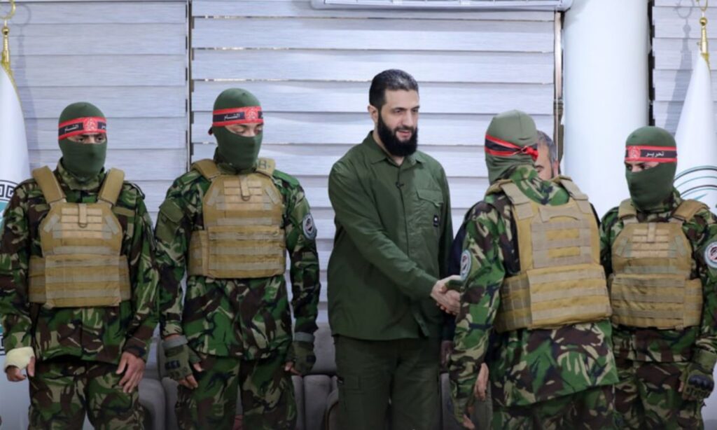 The leader of Hayat Tahrir al-Sham (HTS), Abu Mohammad al-Jolani, during a ceremony honoring fighters in the faction - May 2024 (Amjad)