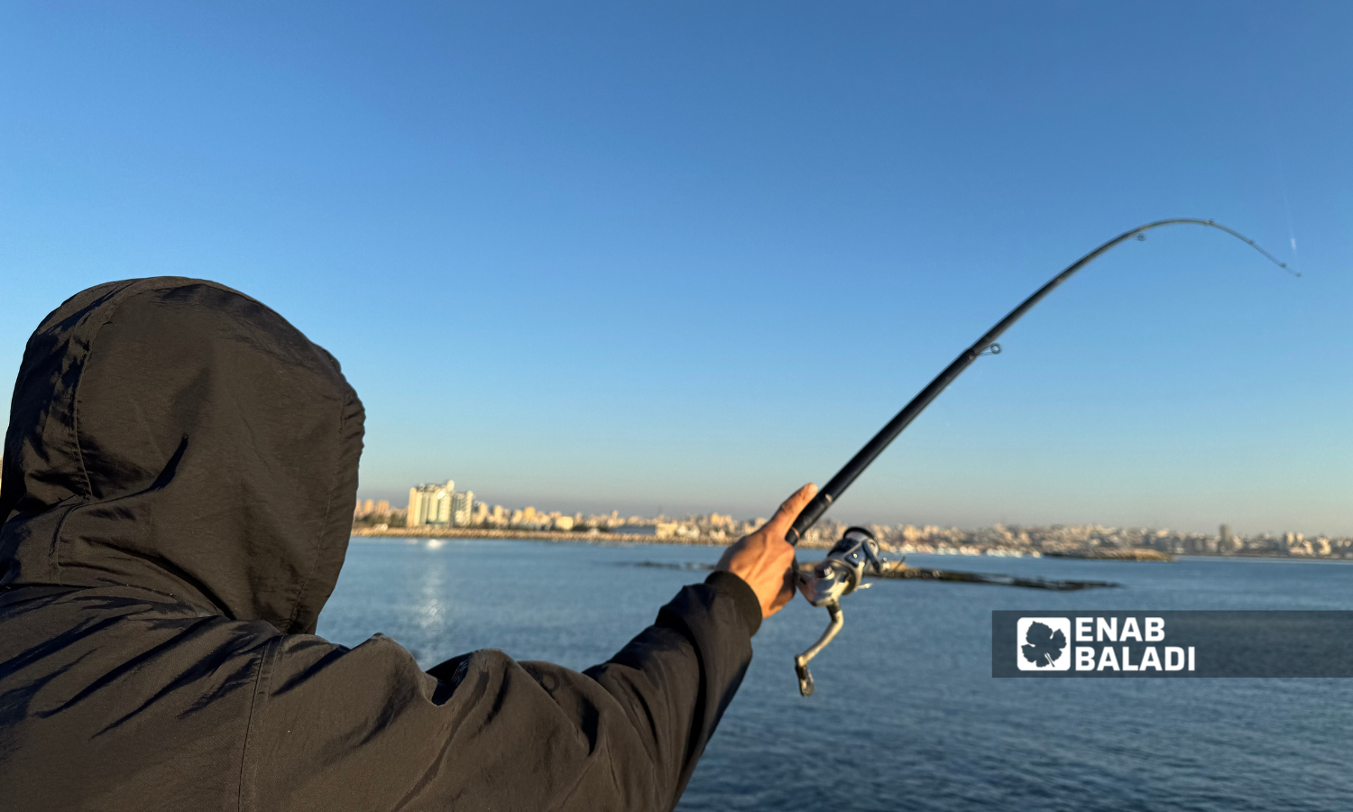 Fishing at Afamia beach in Latakia - December 21, 2024 (Enab Baladi/Dayan Junpaz)
