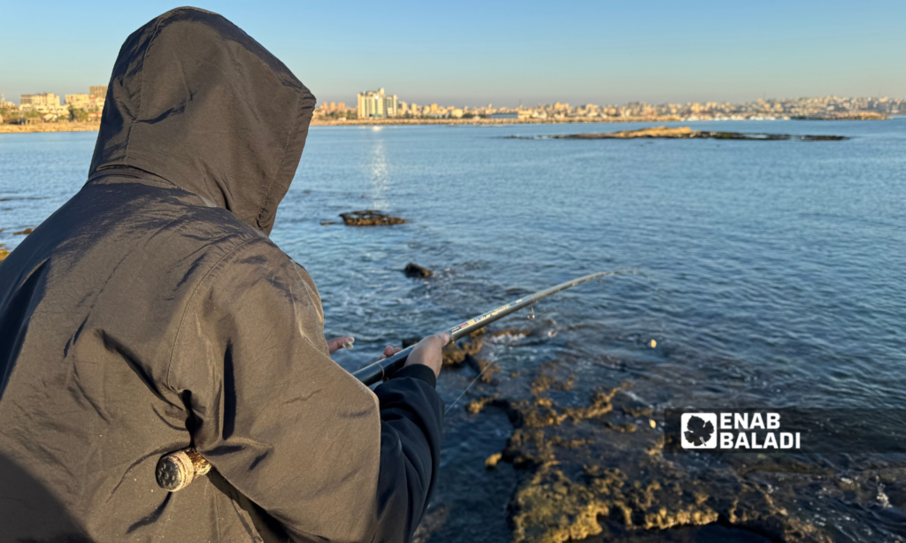 Fishing at Afamia beach in Latakia - December 21, 2024 (Enab Baladi/Dayan Junpaz)