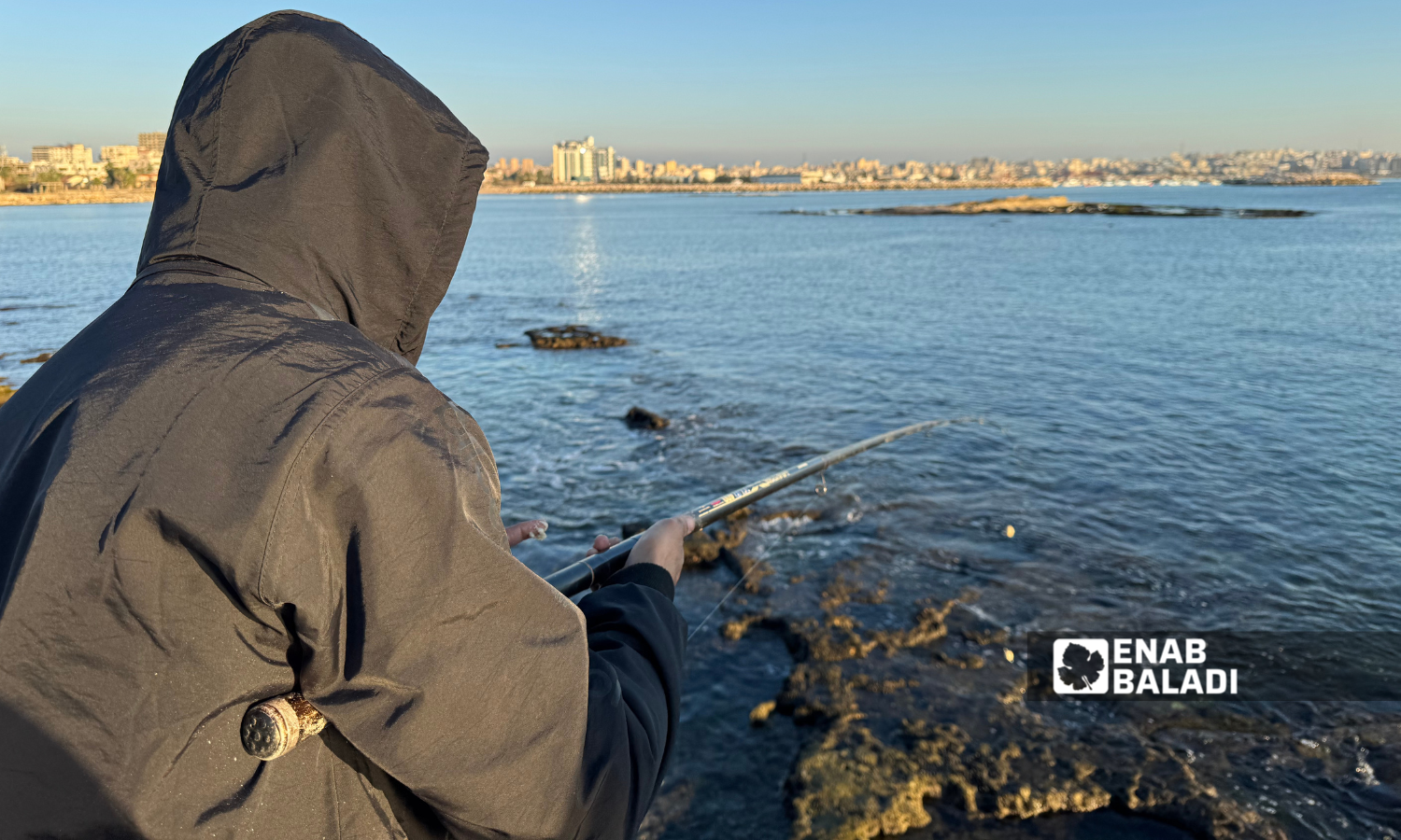 Fishing at Afamia beach in Latakia - December 21, 2024 (Enab Baladi/Dayan Junpaz)
