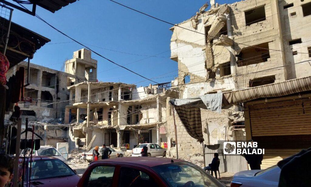 Destroyed buildings on al-Qouatli Street following airstrikes by the Syrian regime’s warplanes during the opposition's control of Douma - January 22, 2024 (Enab Baladi/Sarah al-Ahmad)