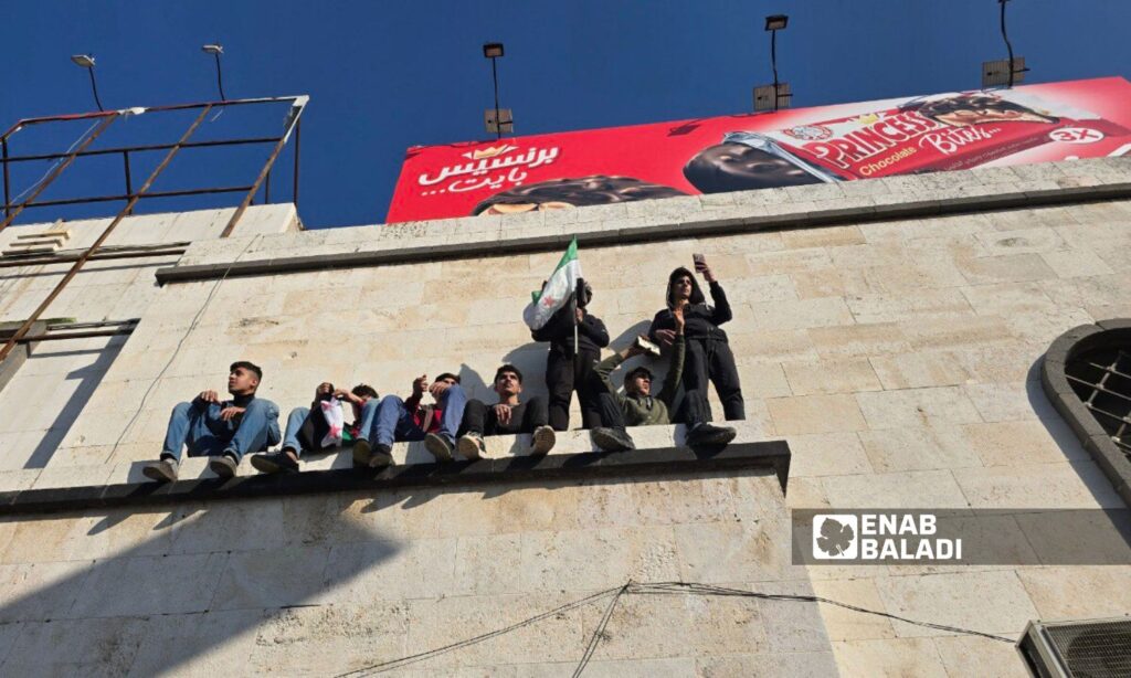 Thousands of Syrians in Hama celebrate the fall of the Assad regime - December 13, 2024 (Enab Baladi/Iyad Abdul Jawad)