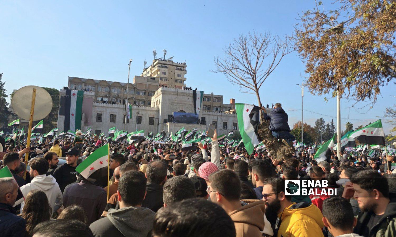 Thousands of Syrians in Hama celebrate the fall of the Assad regime - December 13, 2024 (Enab Baladi/Iyad Abdul Jawad)
