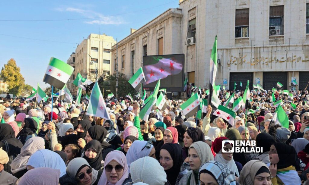 Thousands of Syrians in Hama celebrate the fall of the Assad regime - December 13, 2024 (Enab Baladi/Iyad Abdul Jawad)