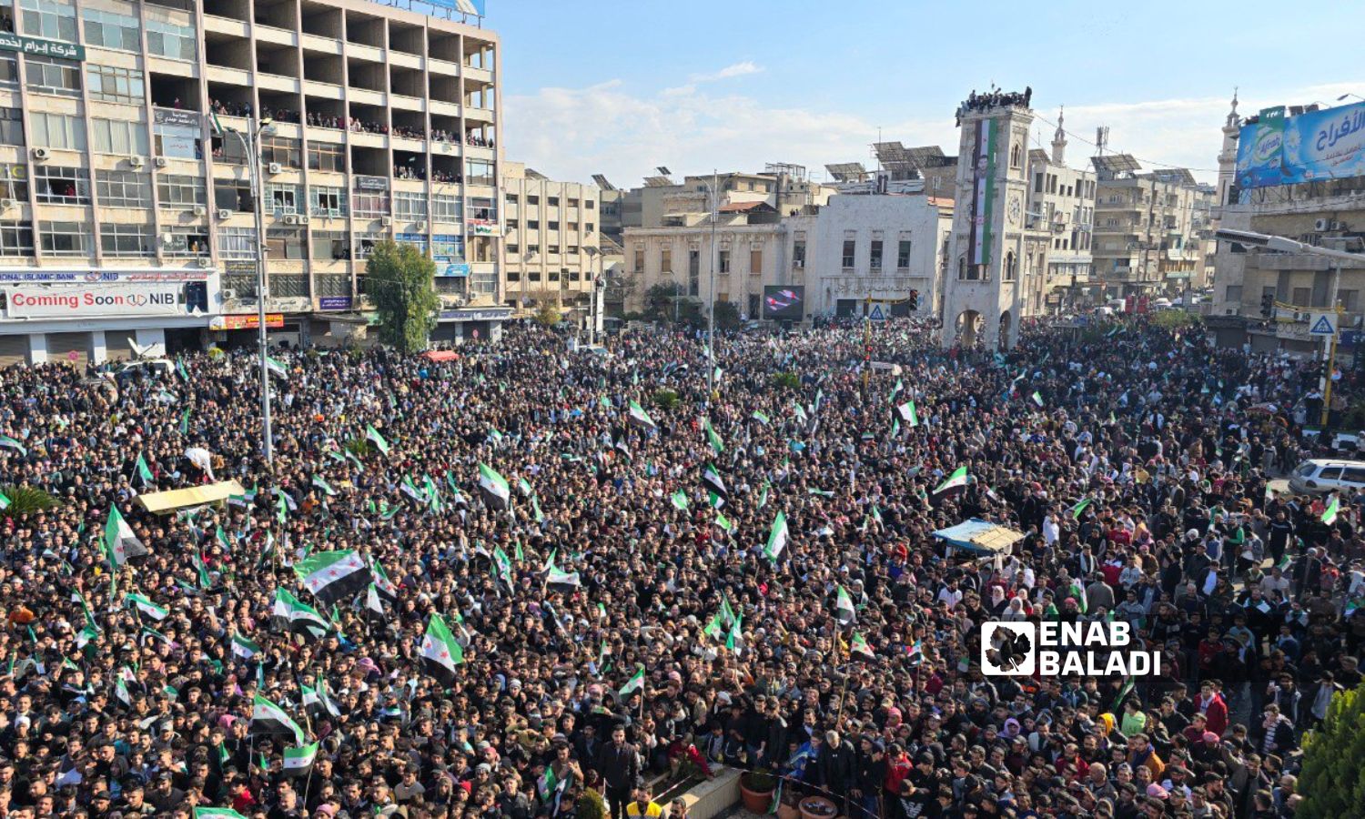 Thousands of Syrians in Hama celebrate the fall of the Assad regime - December 13, 2024 (Enab Baladi/Iyad Abdul Jawad)
