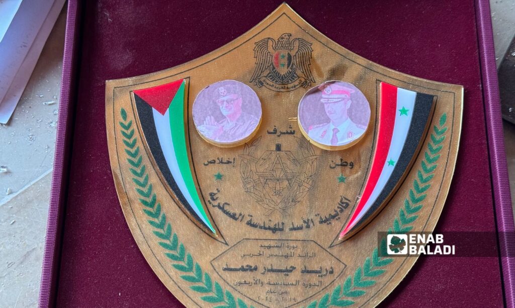 A shield thrown on the ground at the Military Academy in Aleppo - December 3, 2024 (Enab Baladi/Dayan Junpaz)