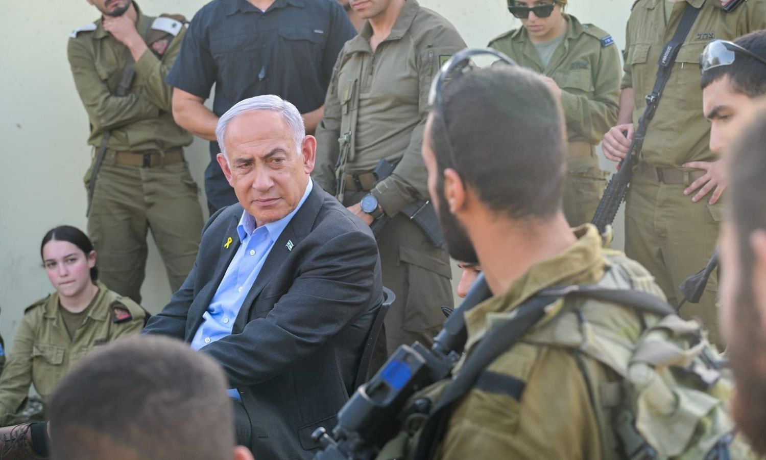 Israeli Prime Minister Benjamin Netanyahu during a visit to wounded Israeli soldiers after a strike by a drone launched by Hezbollah on a military base - October 14, 2024 (Netanyahu/X)