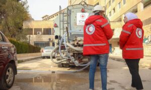 Elements of the Syrian Arab Red Crescent (SARC) securing water for vital infrastructure in the city of Aleppo - December 16, 2024 (Syrian Red Crescent/Facebook)