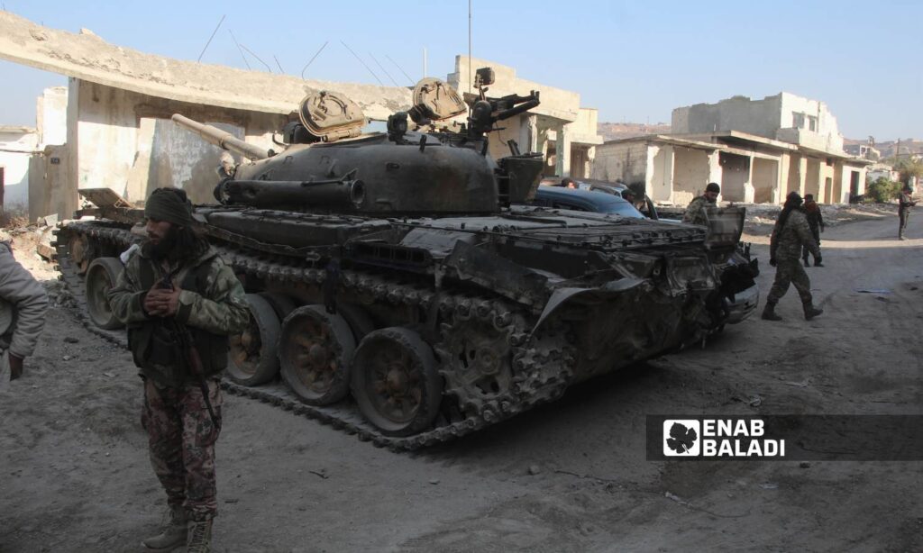 Opposition factions seized weapons and vehicles from the regime forces in Qalaat al-Madiq after fighting and their withdrawal from it - December 3, 2024 (Enab Baladi/Iyad Abdul Jawad)