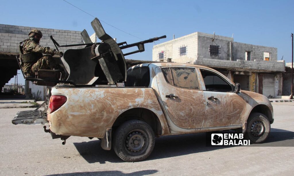 Fighters from the opposition factions in the town of Qalaat al-Madiq after taking control of it - December 3, 2024 (Enab Baladi/Iyad Abdul Jawad)