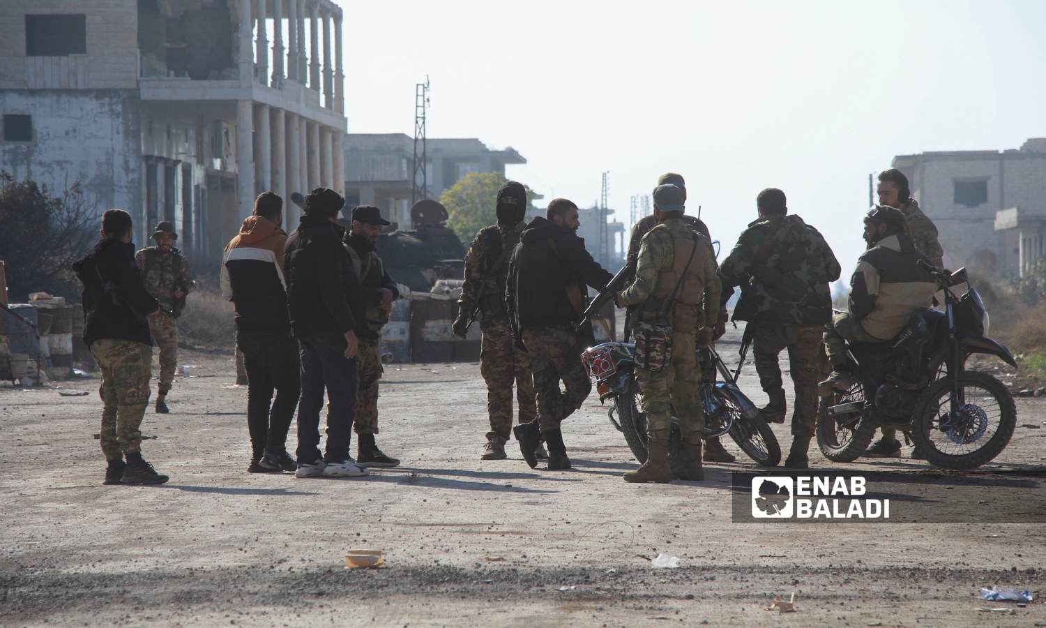 Opposition factions seized weapons and vehicles from regime forces in Qalaat al-Madiq after fighting and their withdrawal from it - December 3, 2024 (Enab Baladi/Iyad Abdul Jawad)