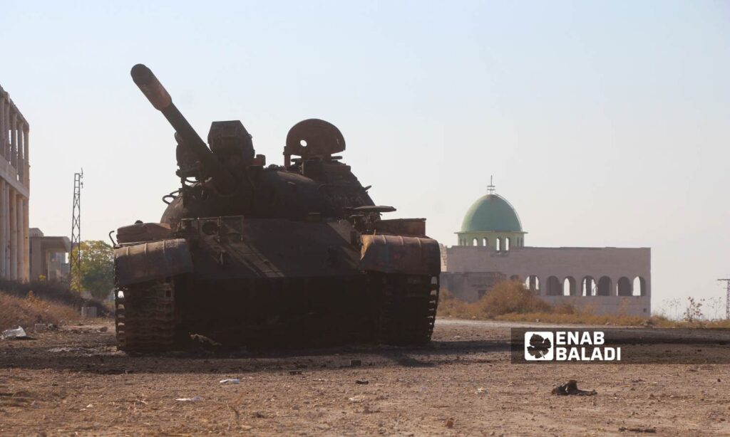 Military mechanisms belonging to the Syrian regime forces in the town of Qalaat al-Madiq were captured by opposition factions - December 3, 2024 (Enab Baladi/Iyad Abdul Jawad)