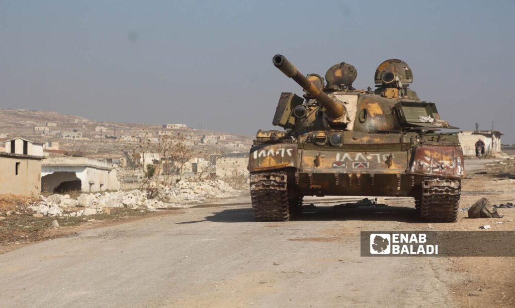 Military mechanisms belonging to the Syrian regime forces in the town of Qalaat al-Madiq were captured by opposition factions - December 3, 2024 (Enab Baladi/Iyad Abdul Jawad)