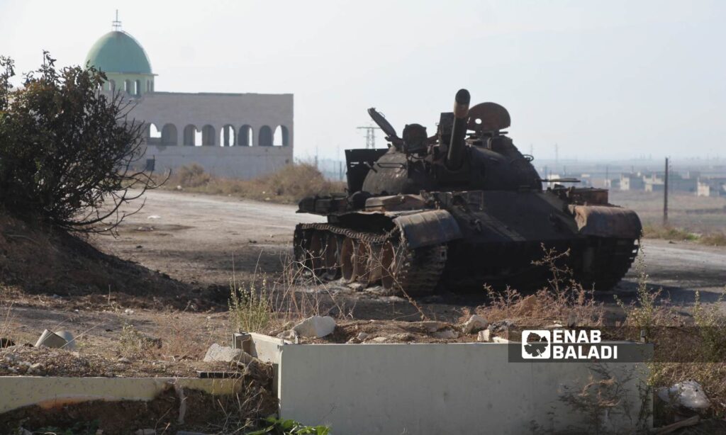 Opposition factions seized weapons and vehicles from the regime forces in Qalaat al-Madiq after fighting and their withdrawal from it - December 3, 2024 (Enab Baladi/Iyad Abdul Jawad)