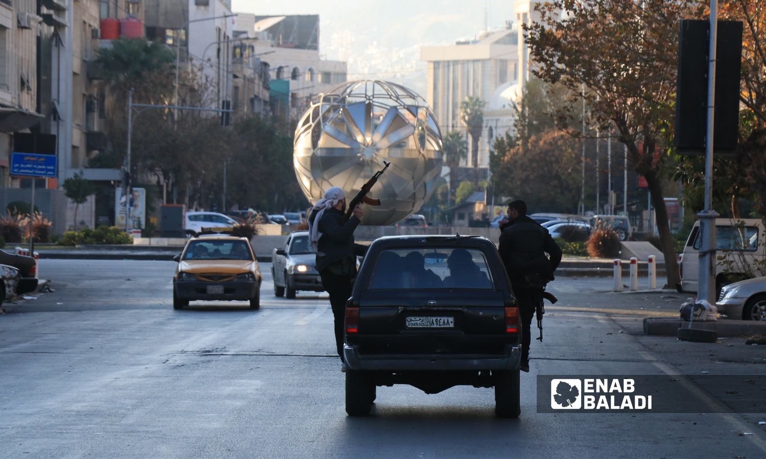 Opposition fighters in the Syrian capital, Damascus - December 8, 2024 (Enab Baladi/Walid al-Idlibi)