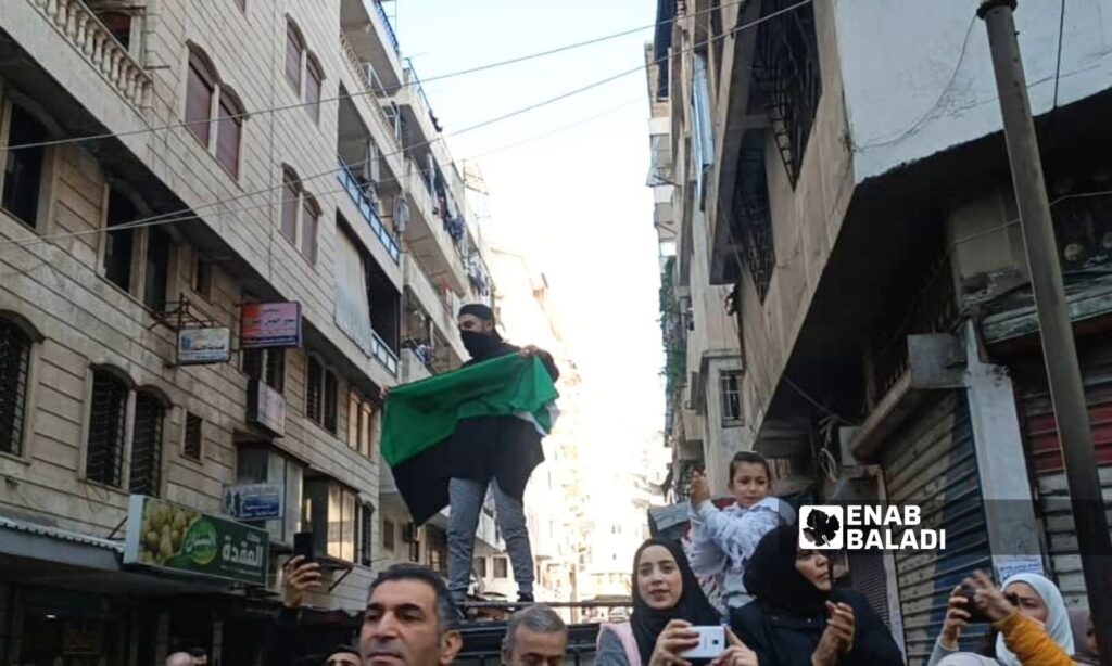 Syrians celebrate Bashar al-Assad's fall in the city of Latakia - December 10, 2024 (Enab Baladi)