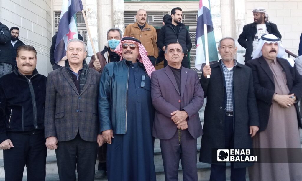 Prominent figures participate in a protest in the city of Qamishli, north of al-Hasakah - December 19, 2024 (Enab Baladi/Ruba Abbas)