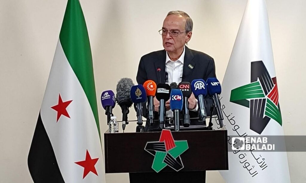 The President of the Syrian National Coalition, Hadi al-Bahra, during a press conference, December 2, 2024 (Enab Baladi)